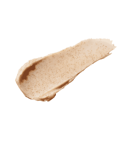 Smear of the Pro Kiss'r Lip-Loving Scrubstick on a white background, showcasing its thick consistency and fine sandy texture.