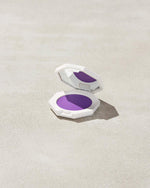 Cheeks Out Freestyle Cream Blush shown in shade Drama Cla$$