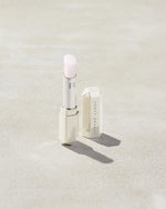 Slip Shine Sheer Shiny Lipstick shown in shade Quartz Candy