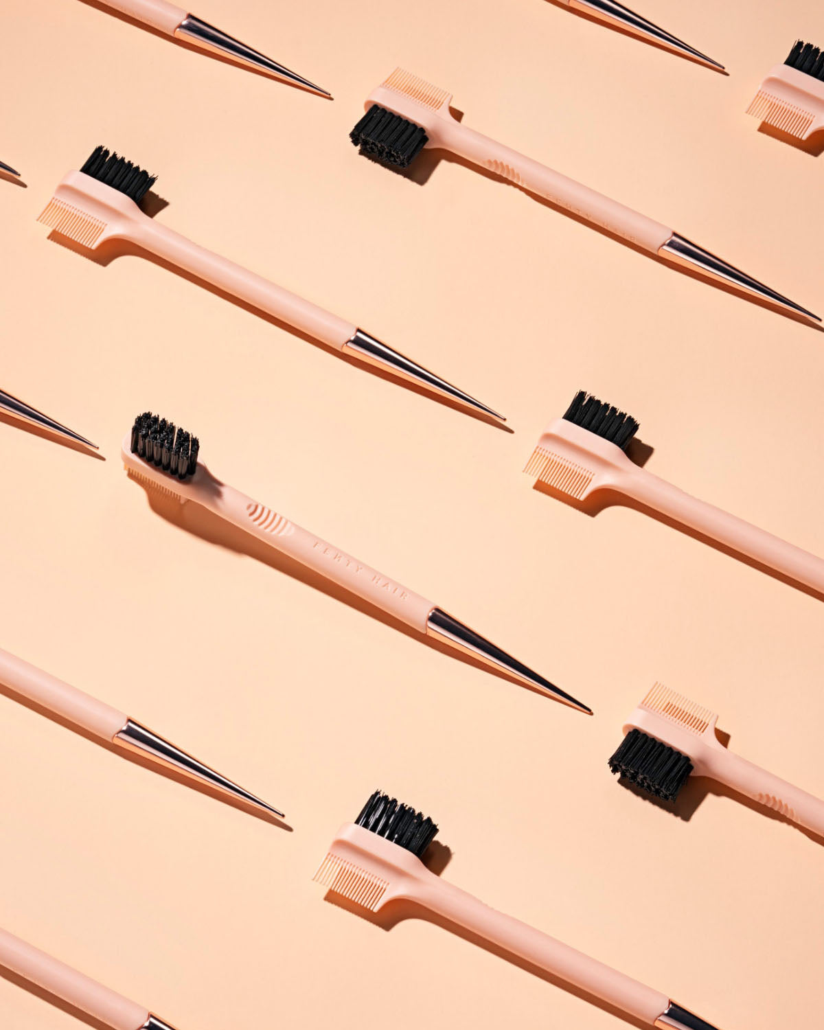 editorial shot of the side stick on a pink background