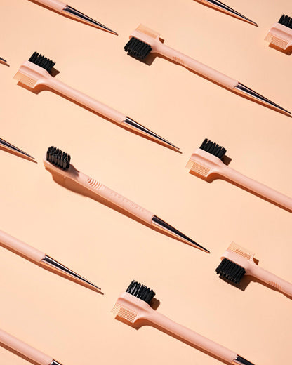 editorial shot of the side stick on a pink background